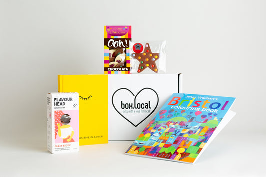 This fabulous hamper includes:

Jenny Urquhart Bristol Colouring Book

The Positive Planner

Flavourhead Tea Crazy Exotic 15 Tea Bags

Ooh! Chocolata Very Jelly D'ooh! Dahs 100g

Ooh! Chocolata Chocolate Star 46g